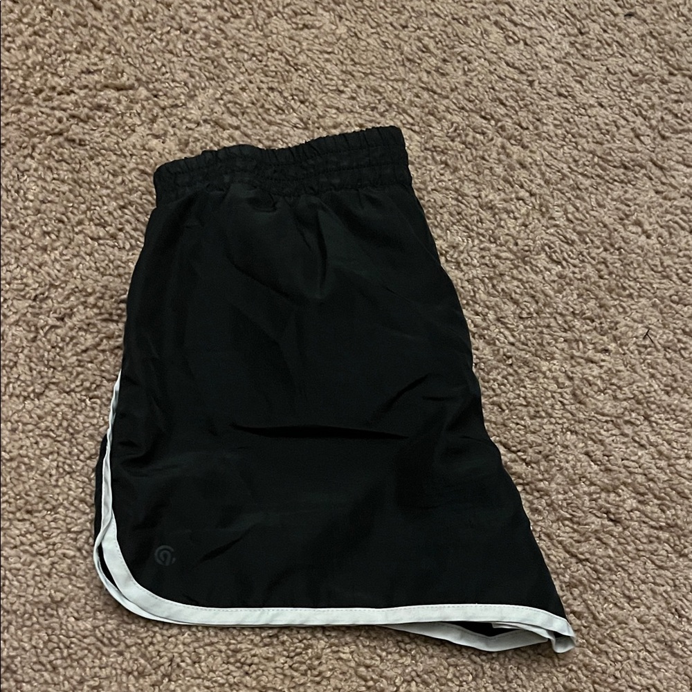 Black Athletic Shorts with White Trim. Girls size 10-12